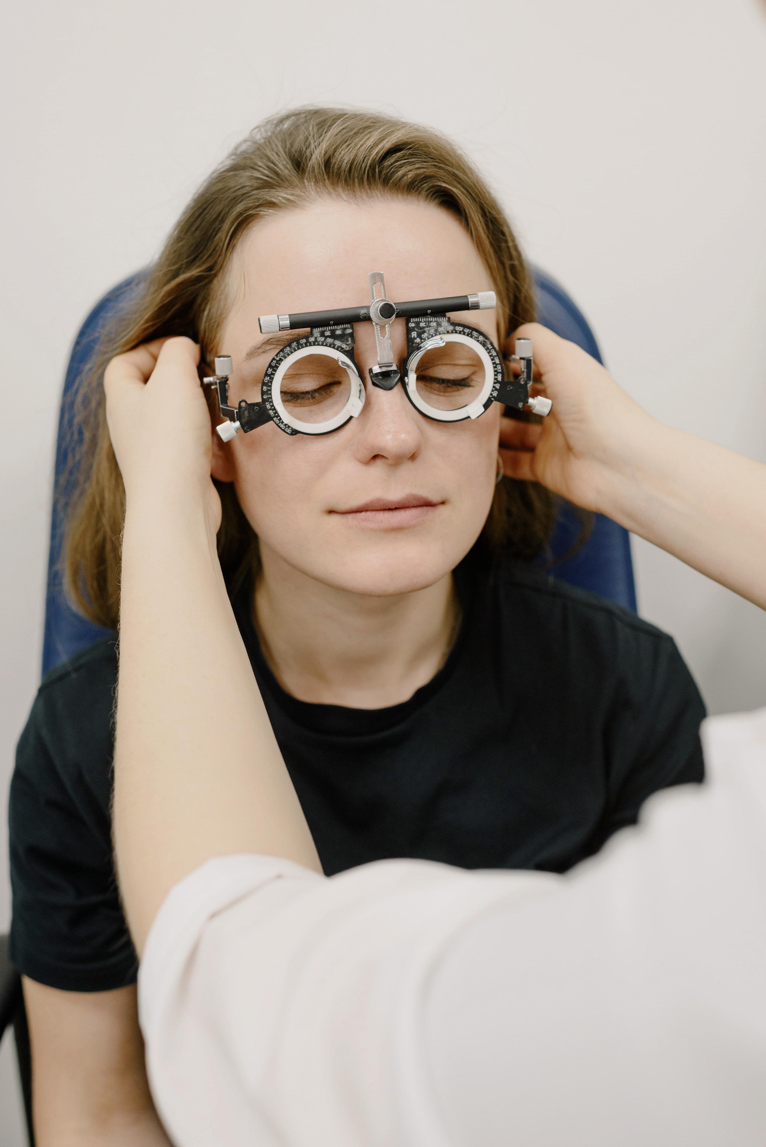 A young girl getting her eyes examined